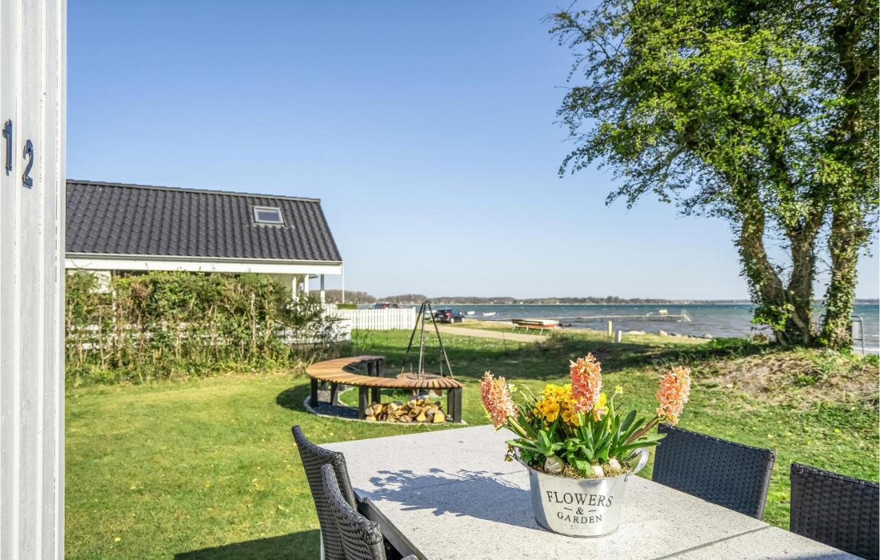 Beach Front Home In Sjolund With Kitchen ภายนอก รูปภาพ